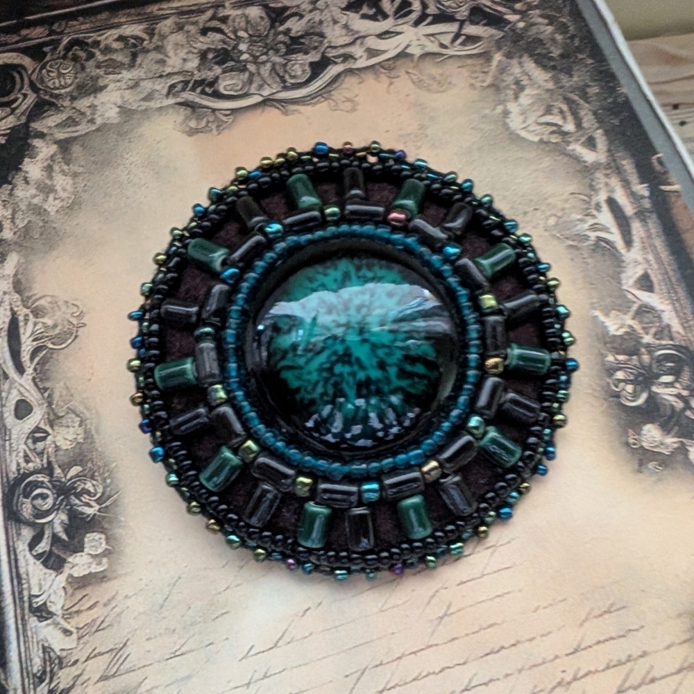 Vintage Handcrafted Beaded Brooch with Green and Black Accents